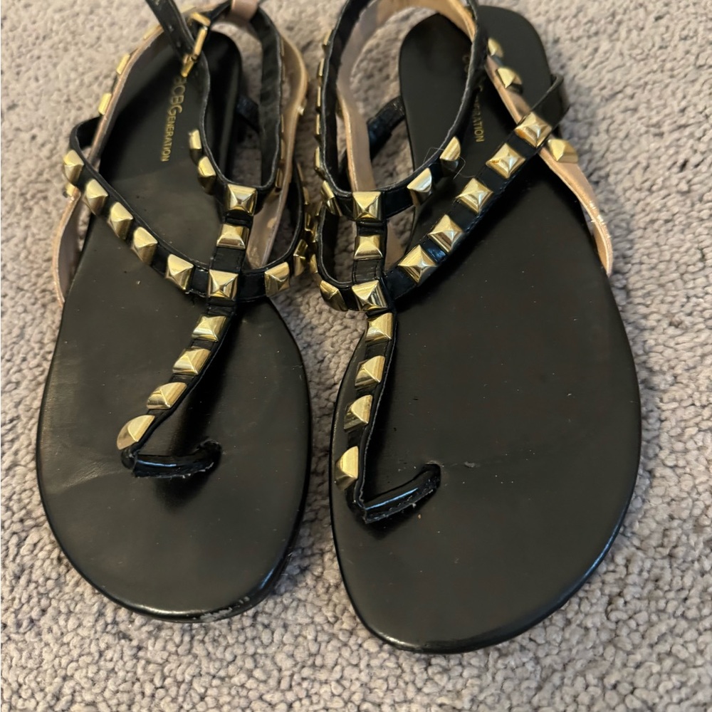 BCBG Generation Black and Gold Studded Sandals